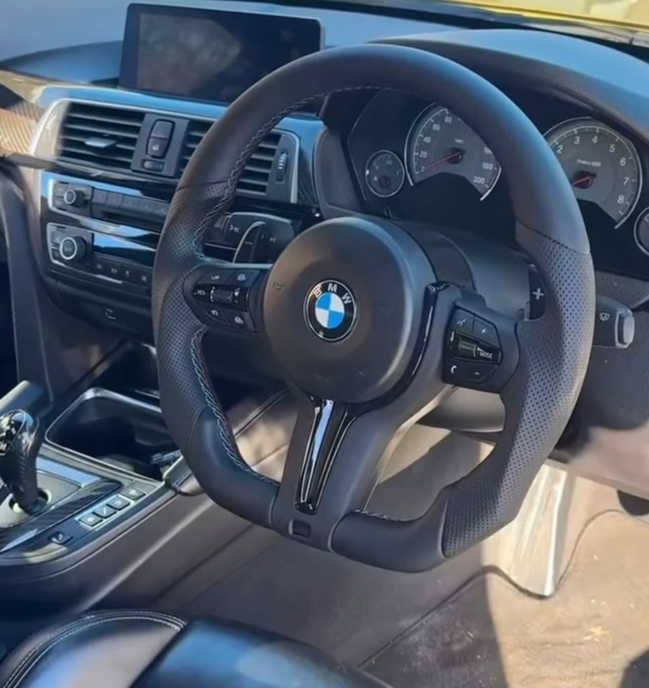 Custom steering wheel in alcantara with a centre stripe